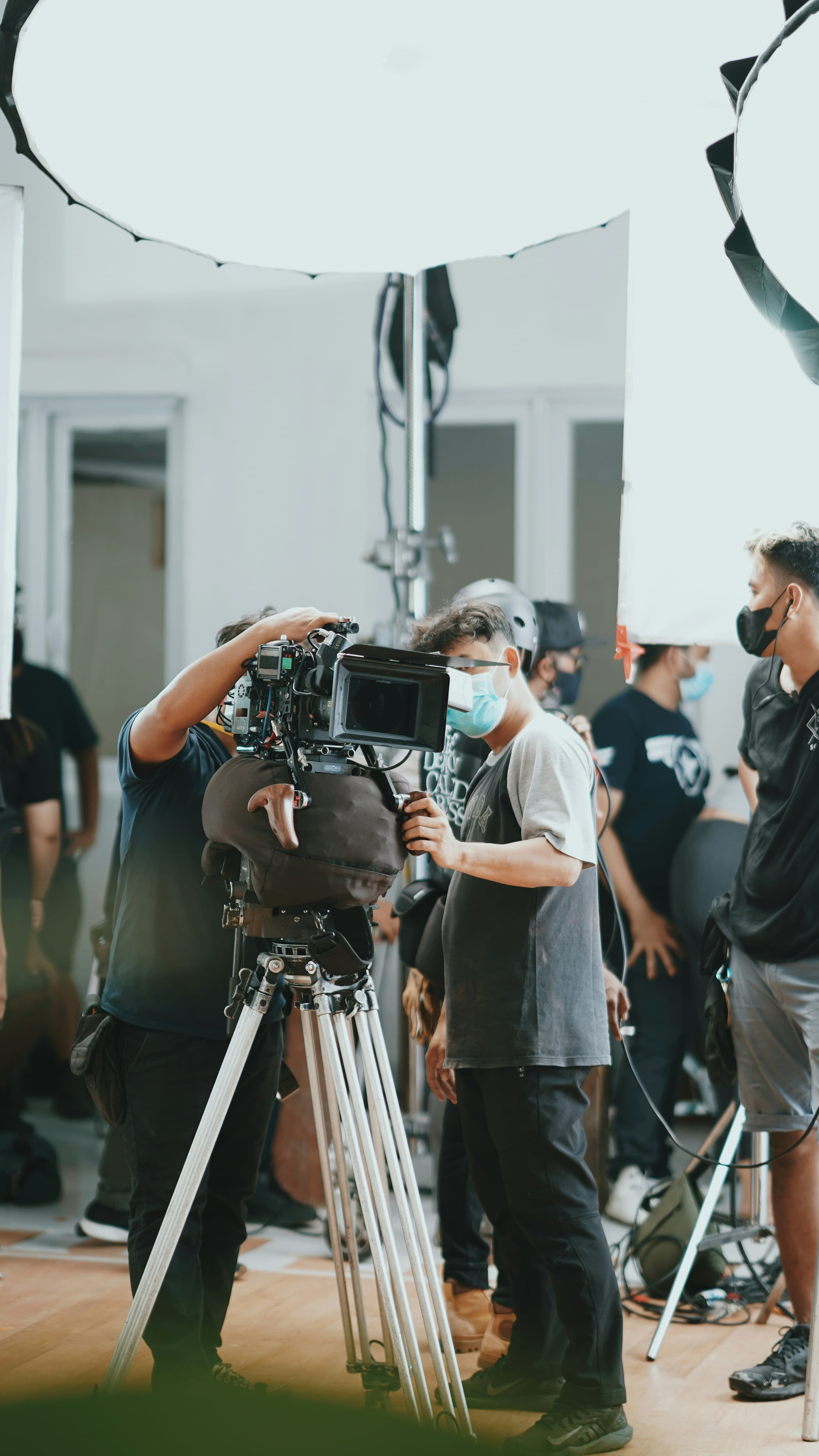 Film crew working on a cinematic production with professional equipment